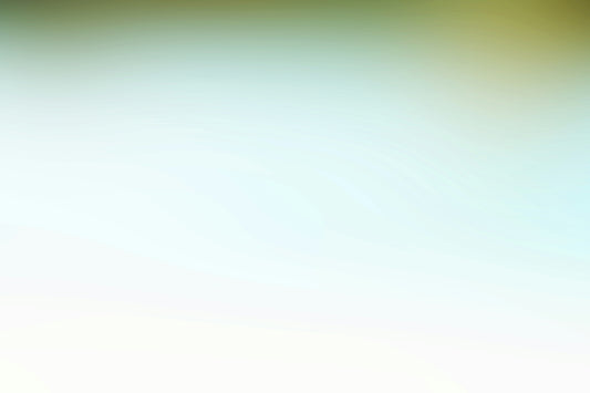 a blurry image of a green and yellow background